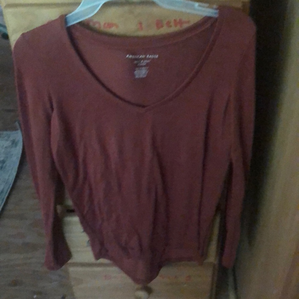 A red long sleeve blouse
